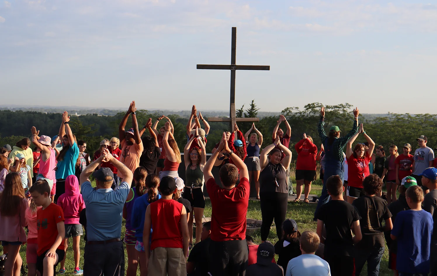 Group of campers in pray outdoors