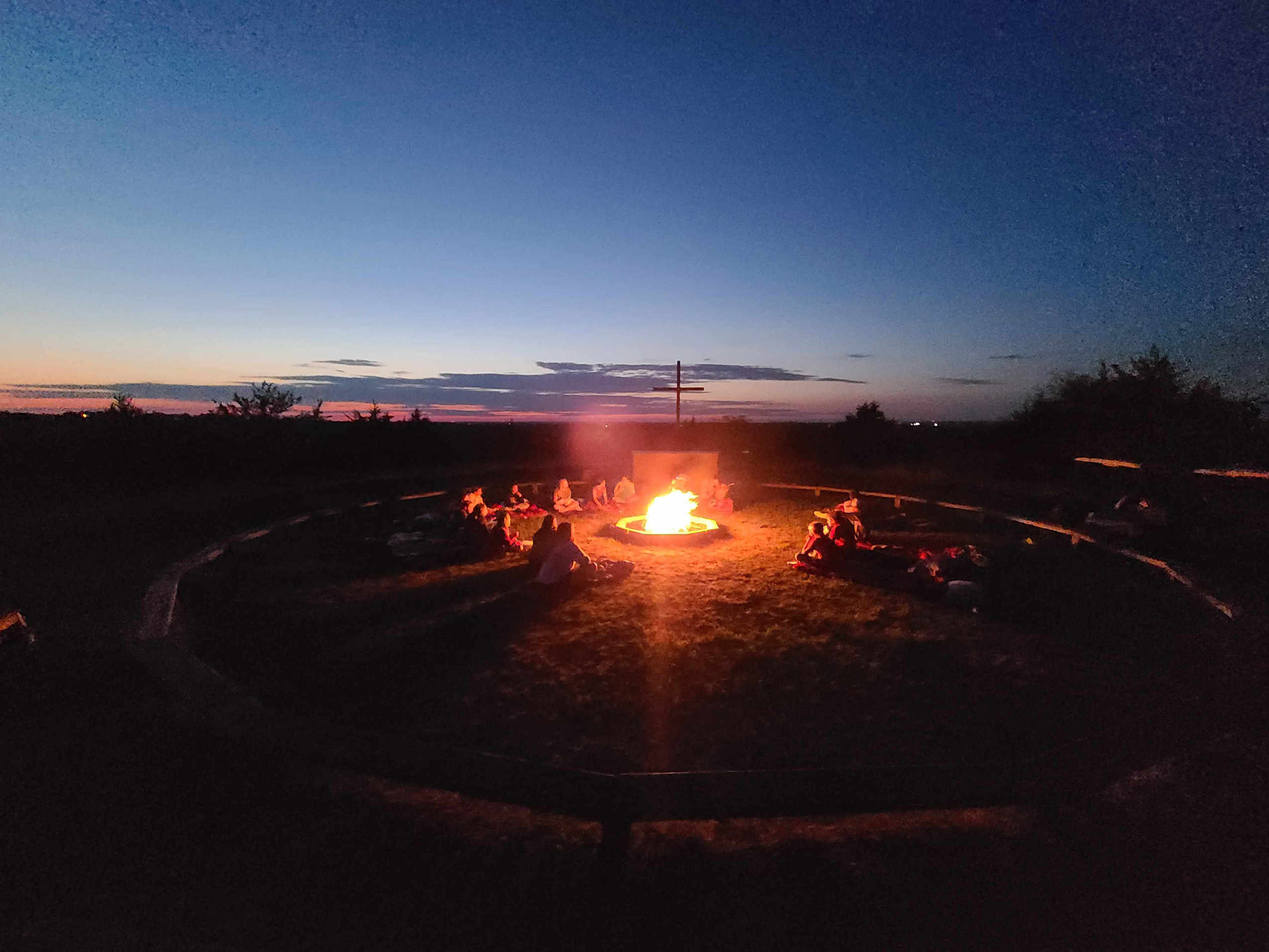 Group of campers in pray outdoors