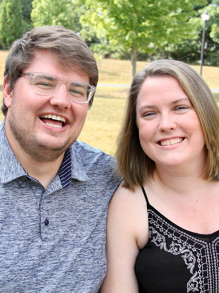 Donation couple smiling 